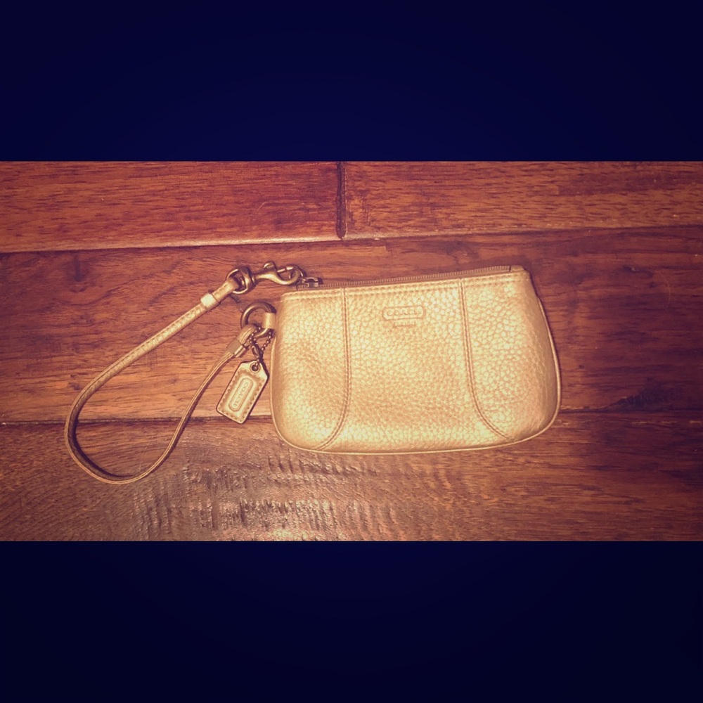 Coach gold leather wristlet